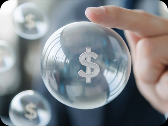Fingers holding a bubble with a dollar sign, symbol of savings growth
